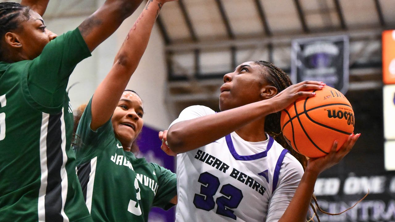 Sugar Bears forward Elizabeth Abiara drives inside against Jacksonville