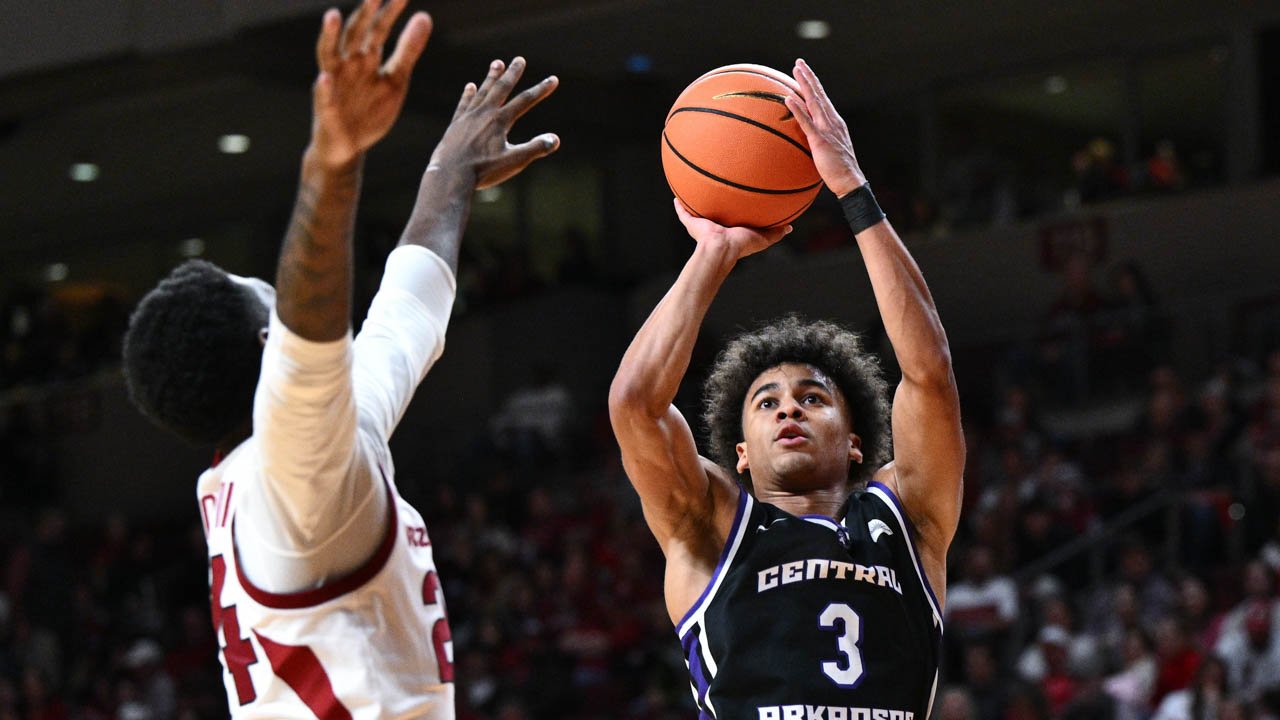 UCA Bears Brayden Fagbemi puts up a shot as Arkansas Razorbacks Billy Richmond defends