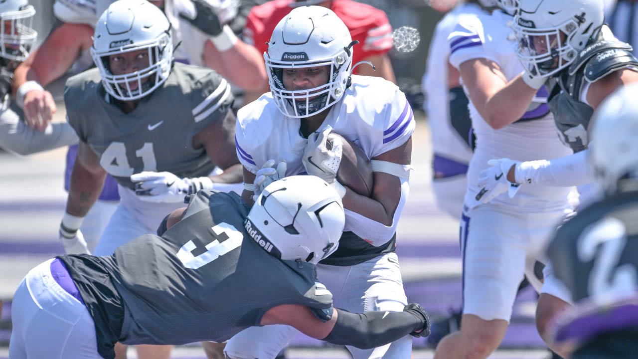 UCA defensive back Dillon Williams tackles running back Landen Chambers during the Bears football spring game