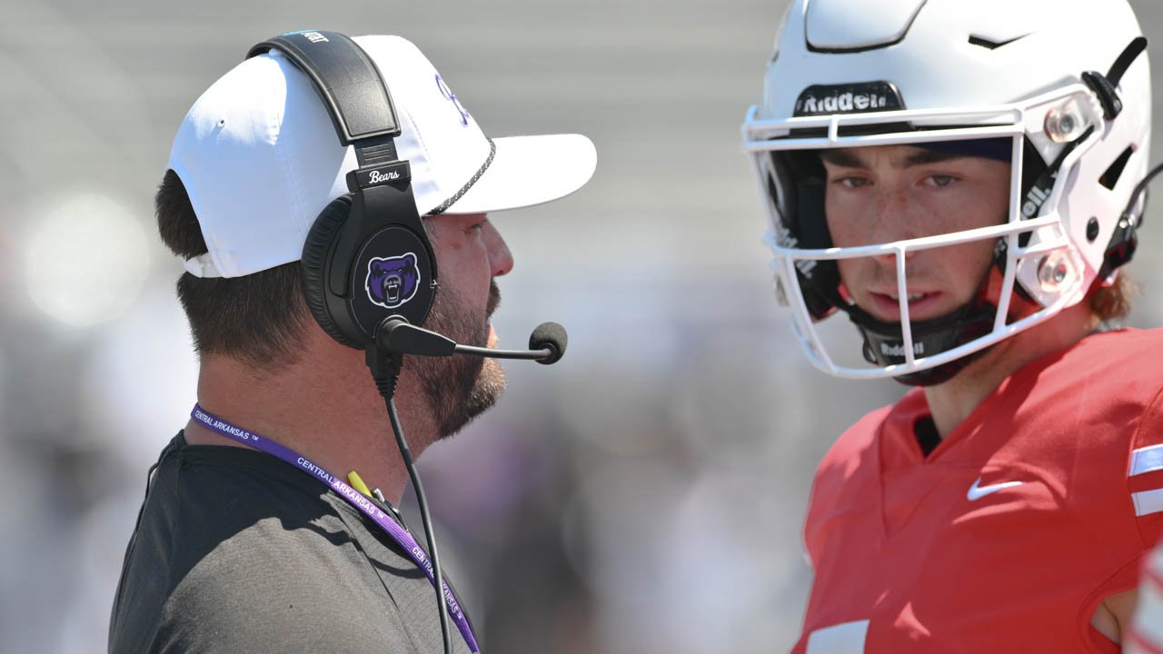 UCA coach Nathan Brown with quarterback Luther Richesson during the Bears football spring game